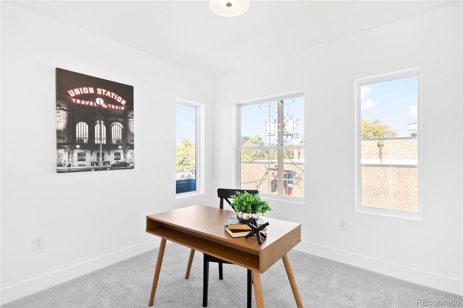 The third bedroom offers versatility for work, creativity, and relaxation in a bright, inspiring setting.