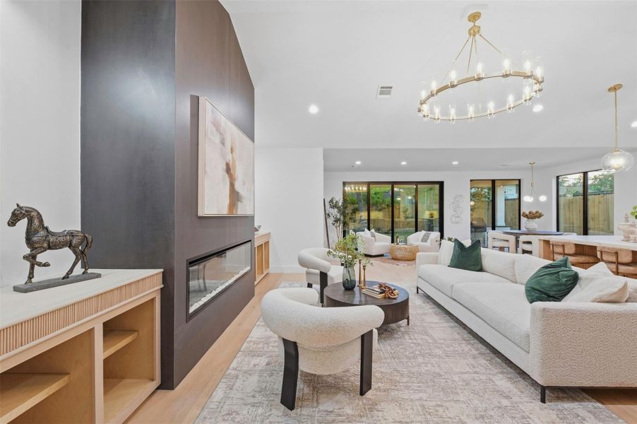 Custom built-in cabinetry in the living room provides beautiful storage and a sophisticated architectural focal point.
