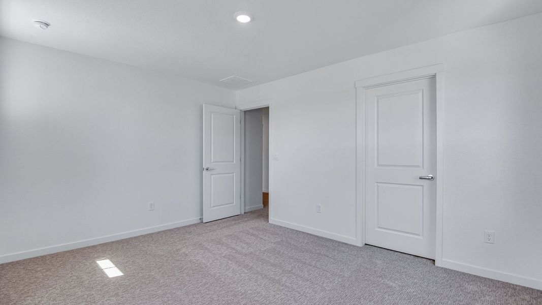 Spacious, unfurnished interior of a new home in Trails at Crowfoot, Parker (Image 45).