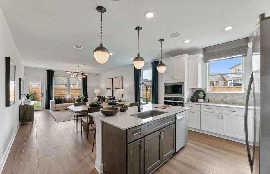 Representative furnished interior of a home built from the Burnet by Pulte Homes in Saddleback at Santa Rita Ranch, Liberty Hill (Image 6). Representative furnished interior of a home built from the Burnet by Pulte Homes in Saddleback at Santa Rita Ranch, Liberty Hill (Image 6).