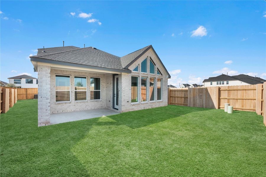 Exterior details and patio area of a home in Elyson - 40', Katy (Image 3).