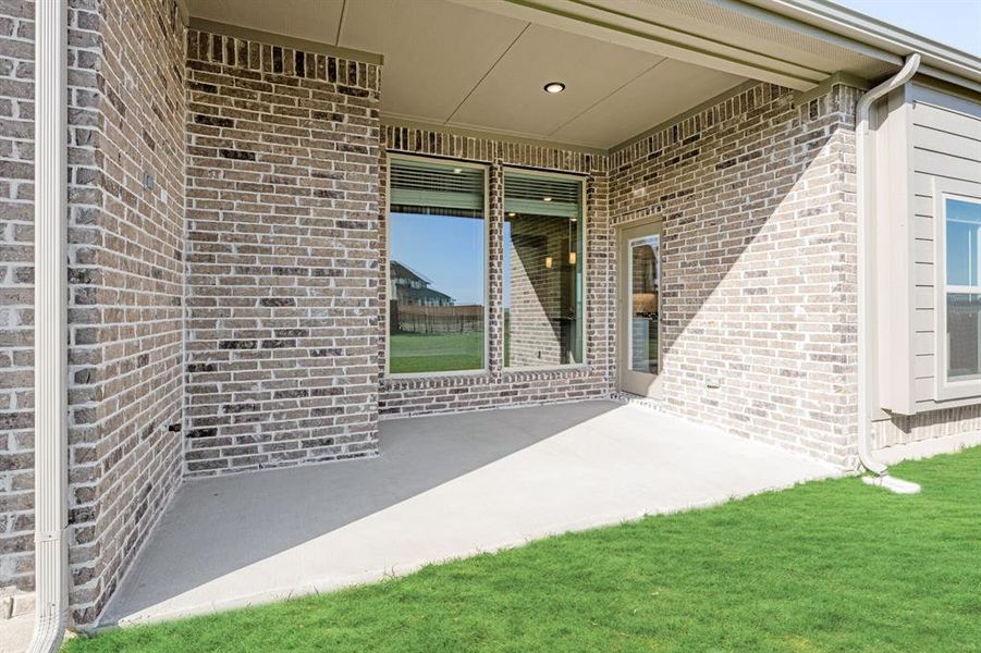 Exterior details and patio area of a home in Silo Mills, Joshua (Image 28).
