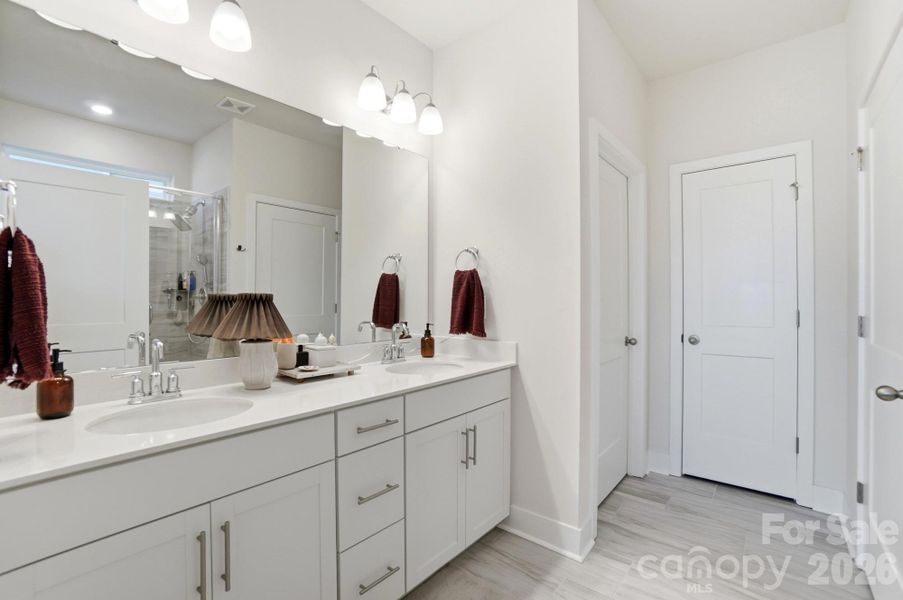Primary bedroom dual vanities