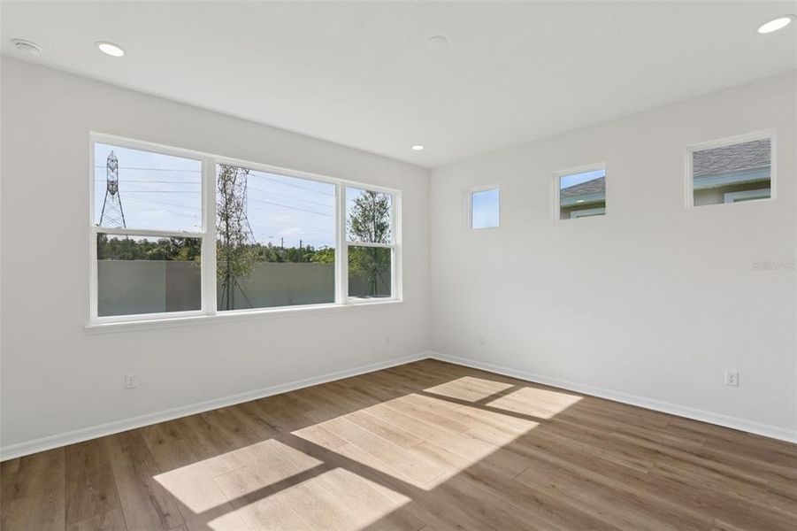 Spacious, unfurnished interior of a new home in Primrose at Longleaf, New Port Richey (Image 37).