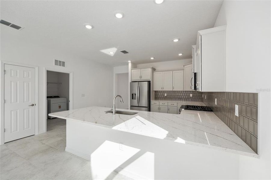 Furnished interior view inside a new home in Calesa Township, Ocala (Image 9). Furnished interior view inside a new home in Calesa Township, Ocala (Image 9).