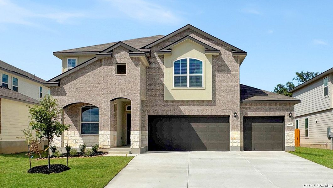 Front exterior of a new home in Riverstone at Westpointe, San Antonio, TX, highlighting curb appeal (Image 2).