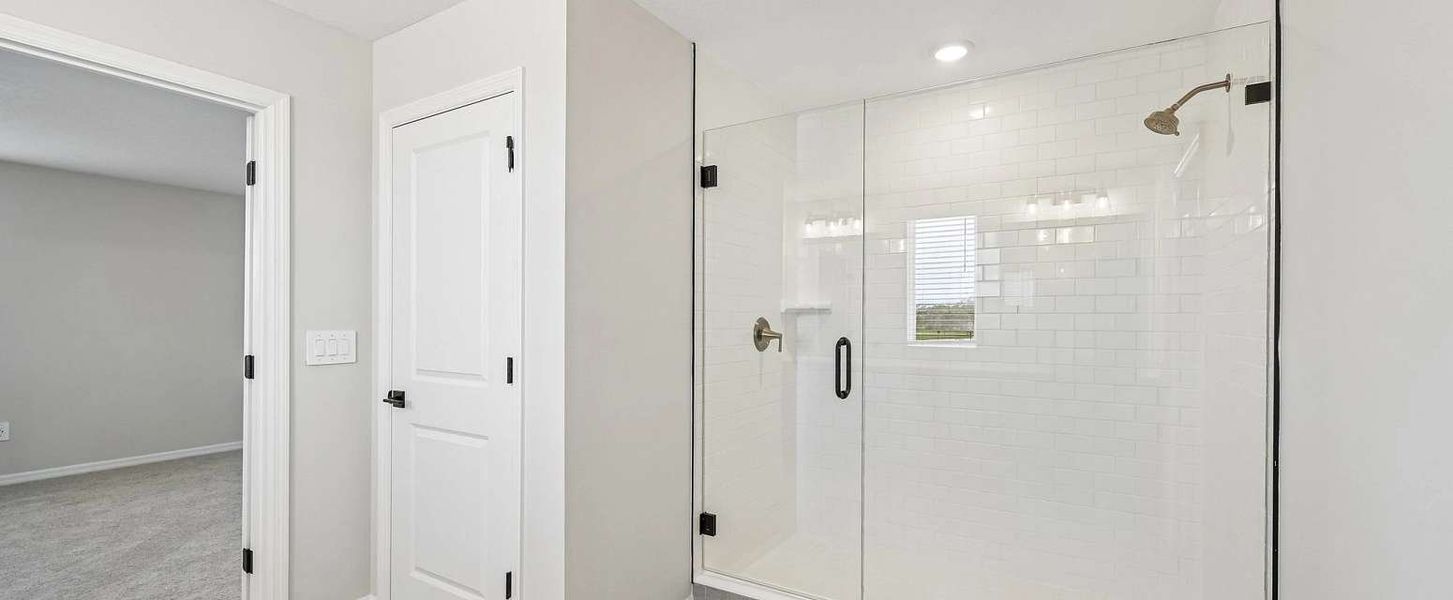 Large walk-in shower in the primary bathroom - Representative images and renderings are for illustrative purposes Large walk-in shower in the primary bathroom - Representative images and renderings are for illustrative purposes