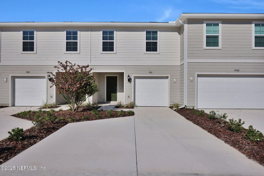 Front exterior of a new home in , Jacksonville, FL, highlighting curb appeal (Image 1). Front exterior of a new home in , Jacksonville, FL, highlighting curb appeal (Image 1).