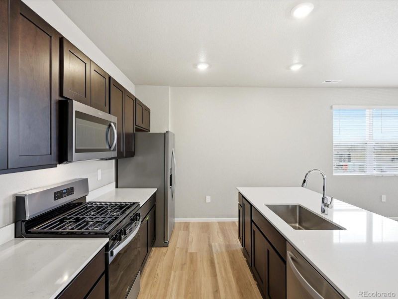 Furnished interior view inside a new home in , Aurora (Image 4).