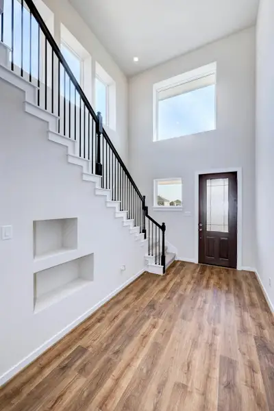Representative unfurnished interior of a home built from the Travis by Scott Felder Homes in Flora, Hutto (Image 11).