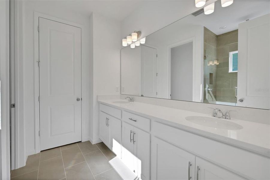 Furnished interior view inside a new home in Serenade at Ovation, Winter Garden (Image 7).