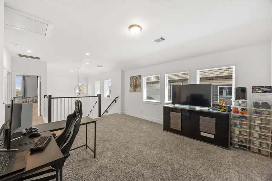 Game Room Up, great space with plenty of light, secluded from living area.