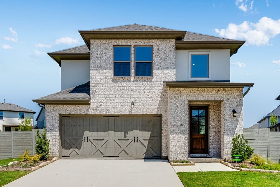 Representative exterior photo of a completed home built from the Chesapeake by Taylor Morrison in The Retreat at Harvest, Argyle, TX (Image 1).