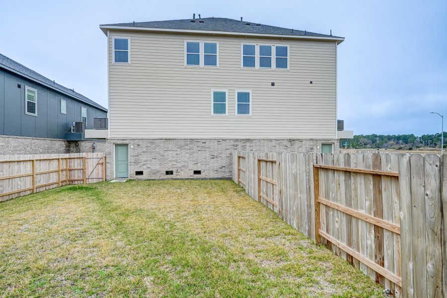 Exterior details and patio area of a home in Townsen Landing, Humble (Image 21). Exterior details and patio area of a home in Townsen Landing, Humble (Image 21).