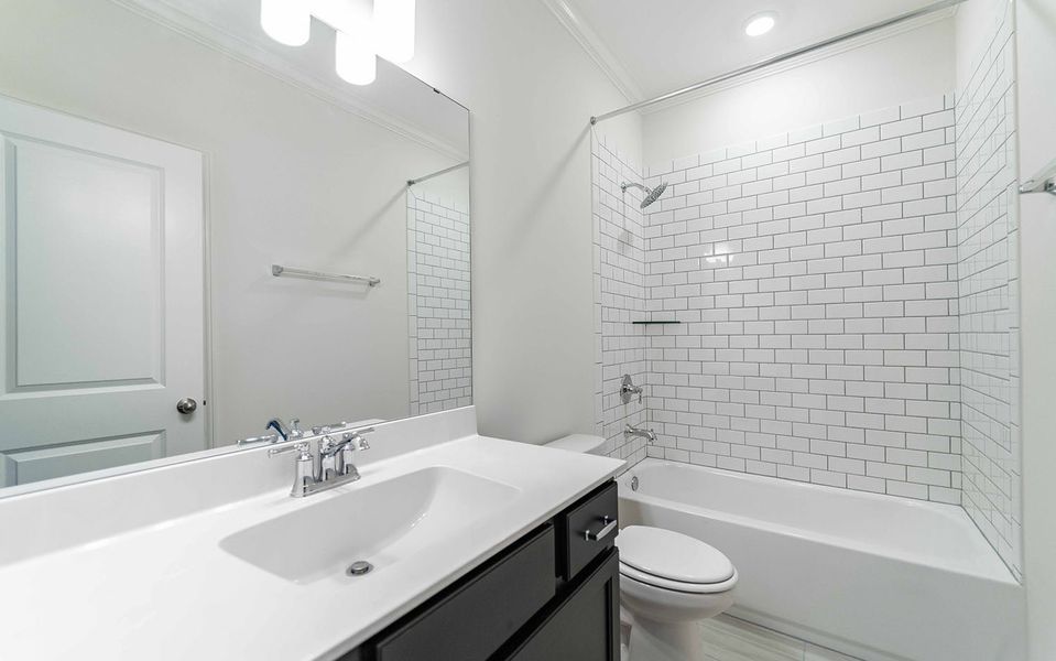 Furnished interior view inside a new home in Aden Woods, Fairview (Image 13).