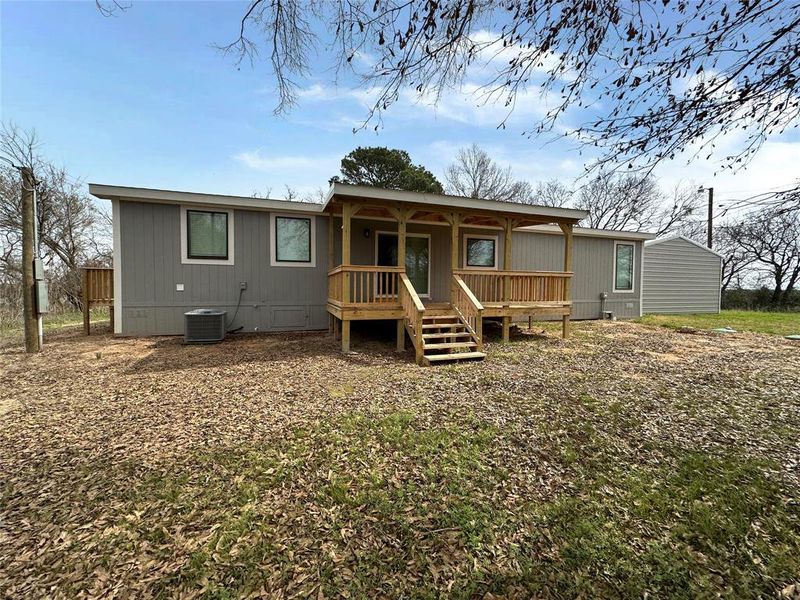 Exterior details and patio area of a home in , Quitman (Image 11).