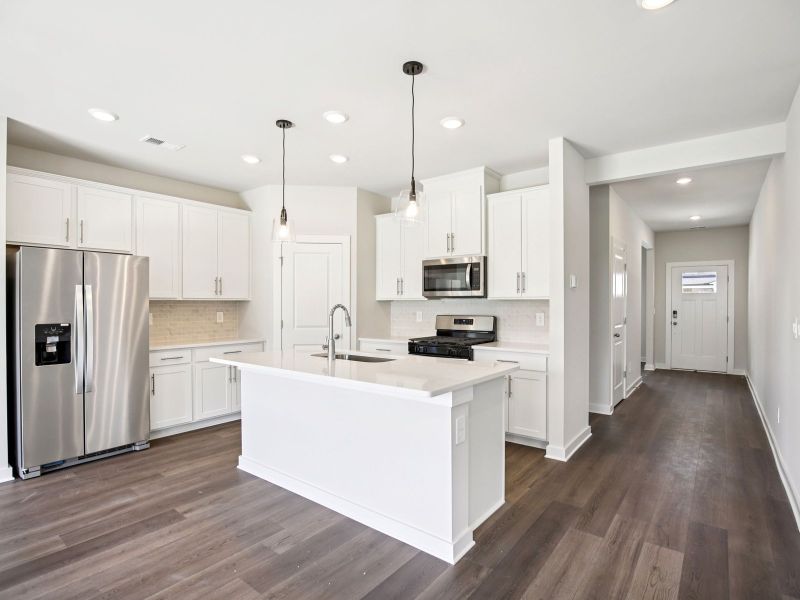Prep dinner in the kitchen without missing the conversation in the great room.