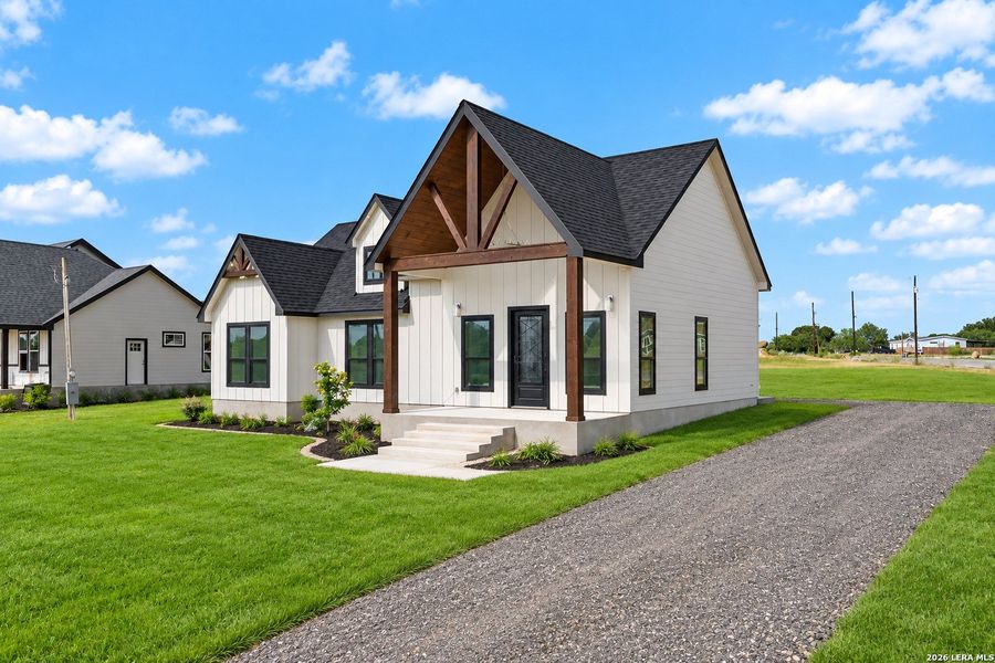 Front exterior of a new home in , Atascosa, TX, highlighting curb appeal (Image 25). Front exterior of a new home in , Atascosa, TX, highlighting curb appeal (Image 25).