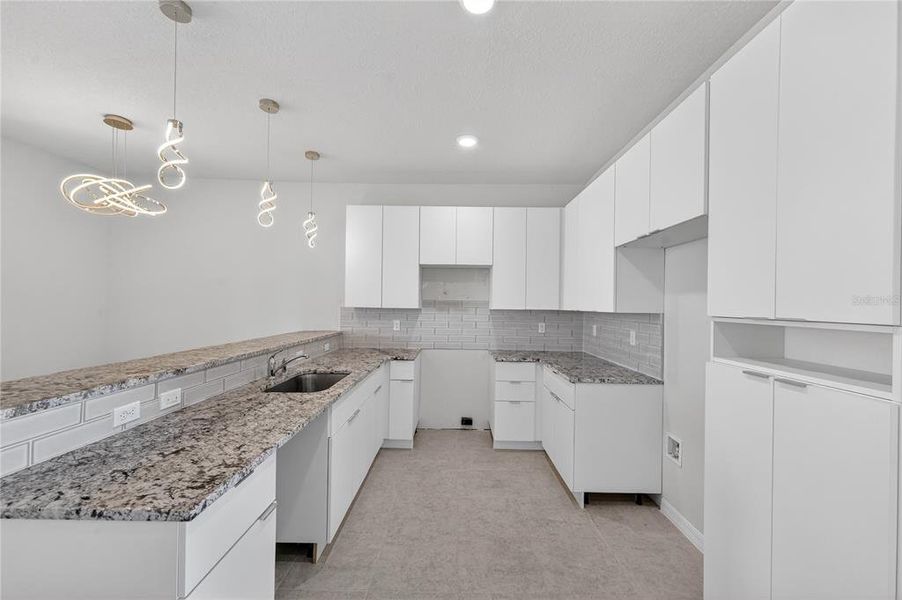 Furnished interior view inside a new home in , Davenport (Image 10).
