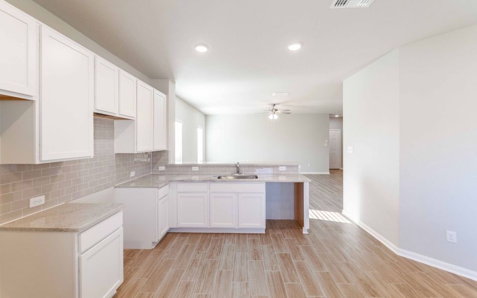 Furnished interior view inside a new home in Swenson Heights, Seguin (Image 4).