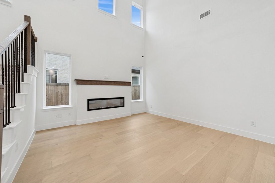 Representative unfurnished interior of a home built from the Riseley by Landon Homes in Fields - East Village, Frisco (Image 13). Representative unfurnished interior of a home built from the Riseley by Landon Homes in Fields - East Village, Frisco (Image 13).