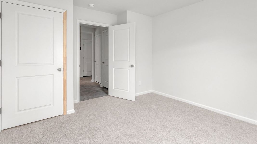 Spacious, unfurnished interior of a new home in Greystone North, Stoneville (Image 20). Spacious, unfurnished interior of a new home in Greystone North, Stoneville (Image 20).