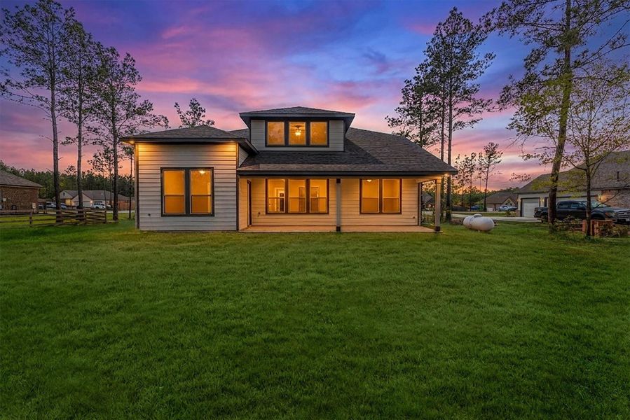 Exterior details and patio area of a home in Deer Pines, Conroe (Image 4).