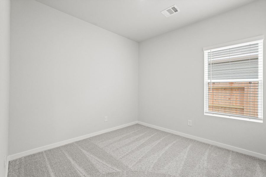 Spacious, unfurnished interior of a new home in Sanford Farms, Waller (Image 18).