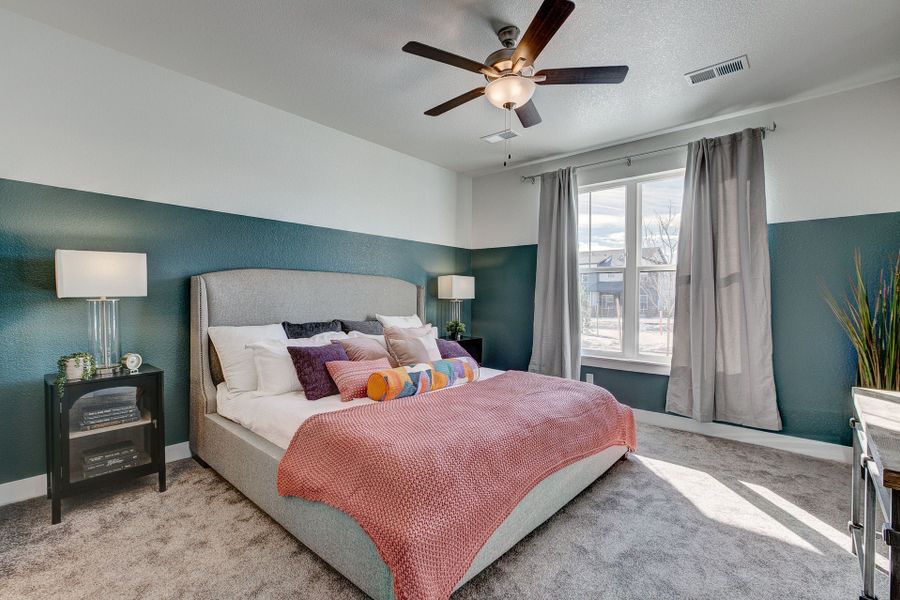 Representative furnished interior of a home built from the The Cambridge by Landmark Homes in The Lakes at Centerra, Loveland (Image 18).