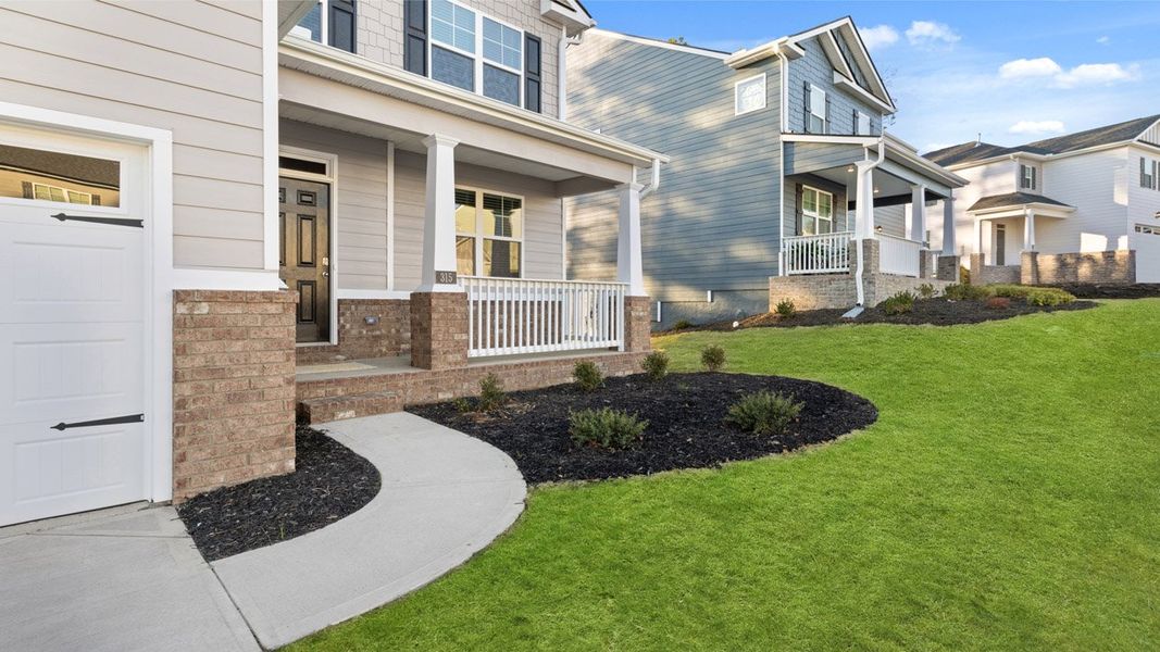 Exterior details and patio area of a home in Southwind Village, Evans (Image 3).