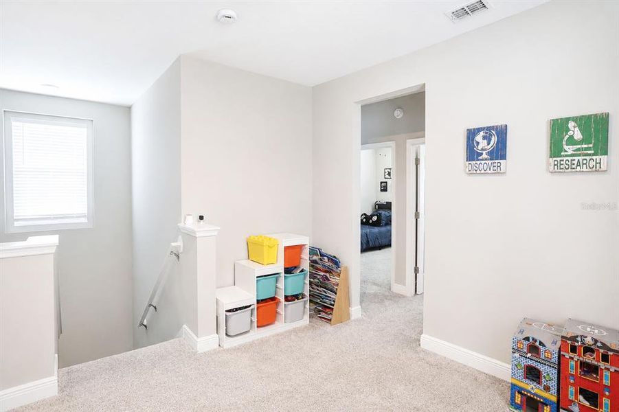 Furnished interior view inside a new home in Highland Ridge, Winter Garden (Image 19).