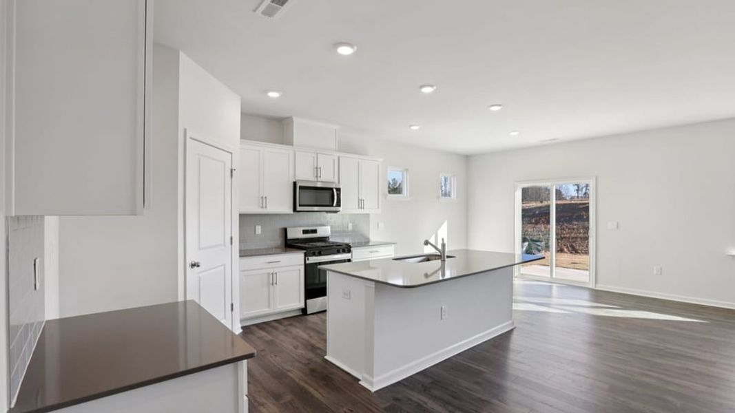 Furnished interior view inside a new home in The Landing at Winston Pointe, Clayton (Image 6). Furnished interior view inside a new home in The Landing at Winston Pointe, Clayton (Image 6).