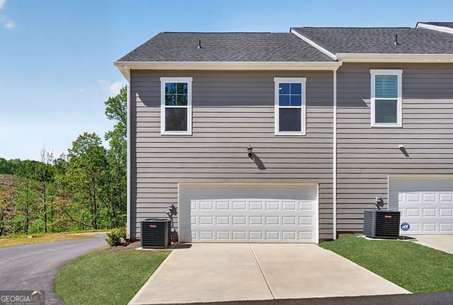 Front exterior of a new home in The Park at Gainesville Township, Gainesville, GA, highlighting curb appeal (Image 15).