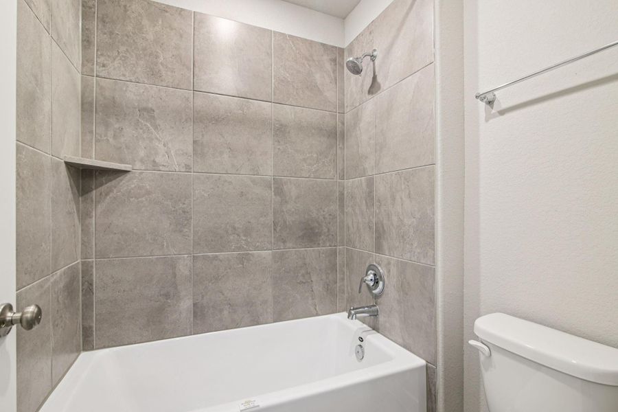 Furnished interior view inside a new home in Pine Lake Cove - Premier Series, Montgomery (Image 6). Furnished interior view inside a new home in Pine Lake Cove - Premier Series, Montgomery (Image 6).