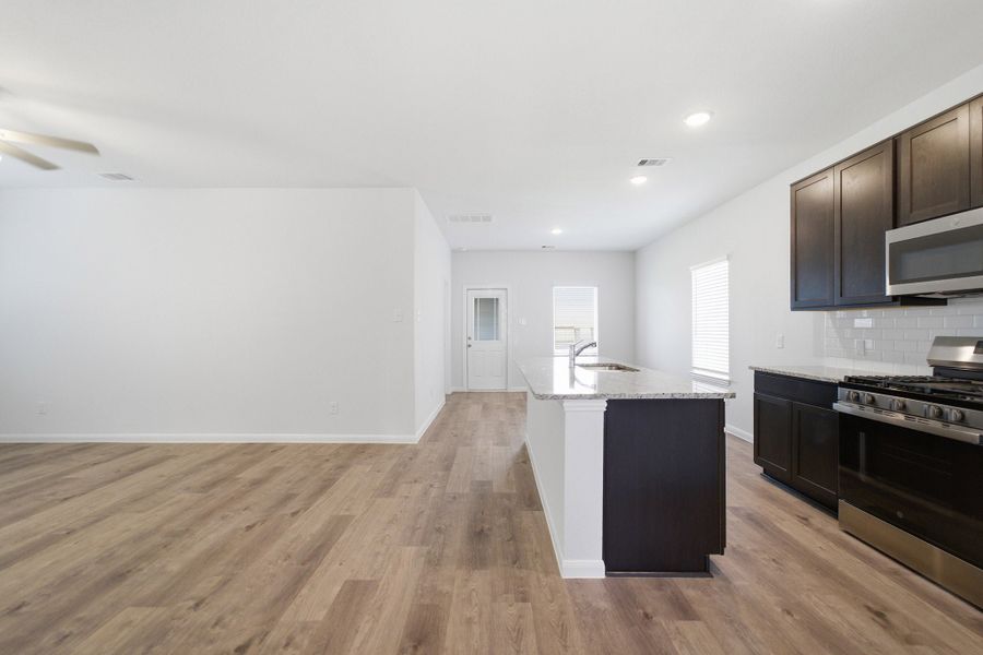 Furnished interior view inside a new home in Windrose Green, Angleton (Image 6).