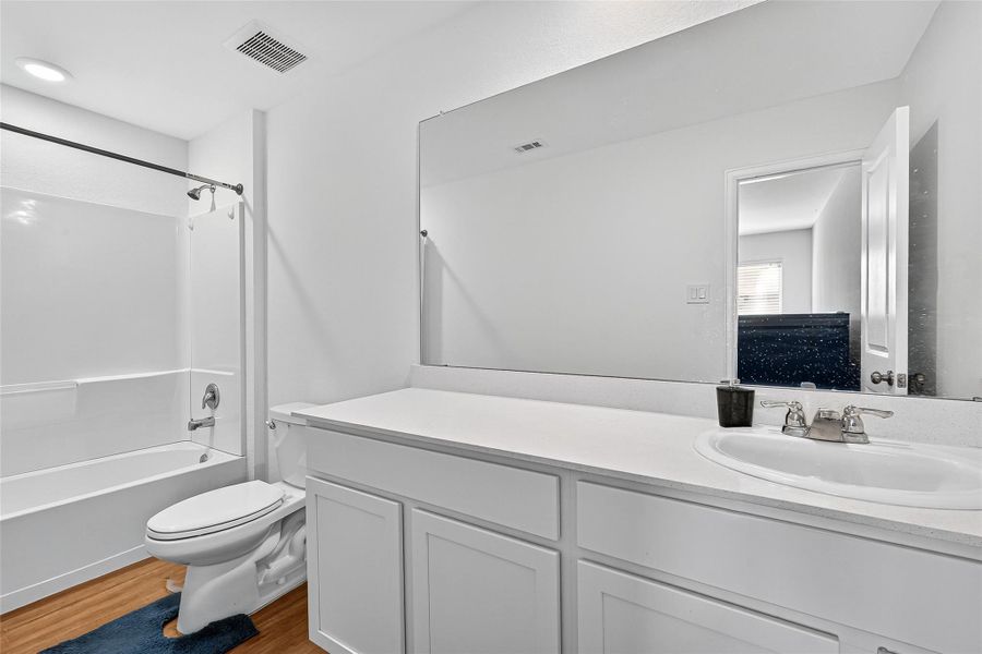 Furnished interior view inside a new home in Sunterra: Watermill Collection, Katy (Image 10).