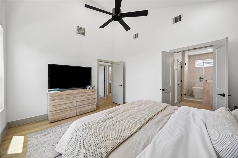 Generous proportions provide plenty of space for a king sized bedroom set while maintaining an airy, open feel. Generous proportions provide plenty of space for a king sized bedroom set while maintaining an airy, open feel.