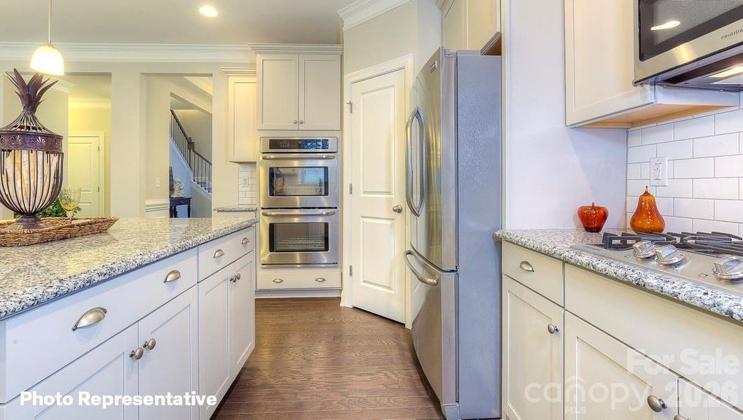 Furnished interior view inside a new home in Sylvan Creek, Denver (Image 11).