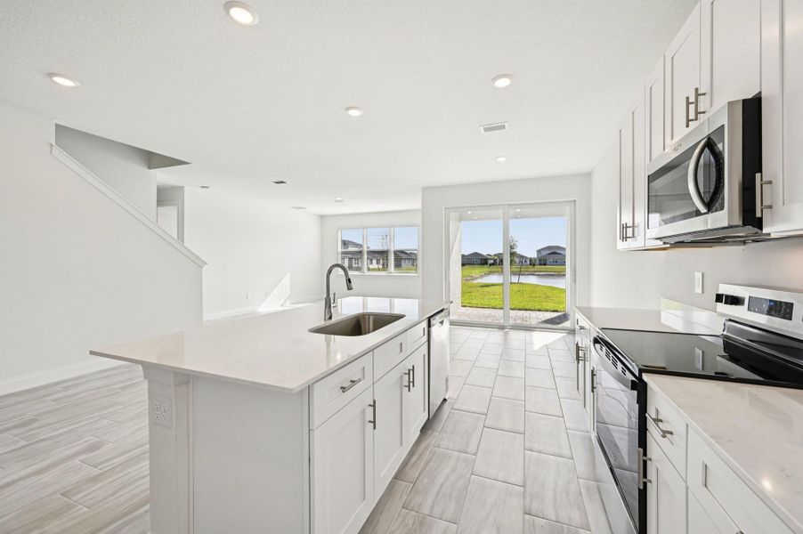 Furnished interior view inside a new home in Brystol at Wylder - Reserve Series, Port St. Lucie (Image 14).