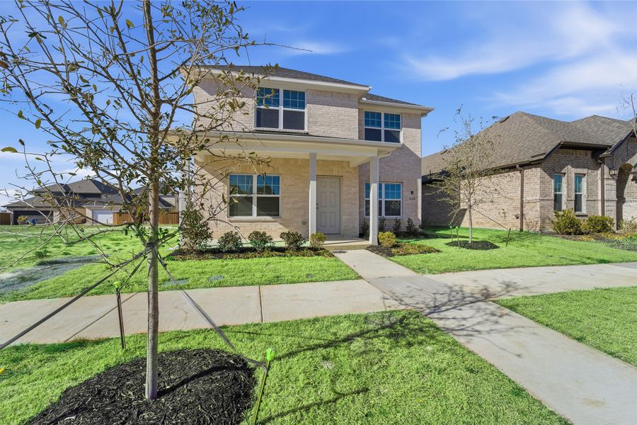 Front exterior of a new home in La Terra, Celina, TX, highlighting curb appeal (Image 2).