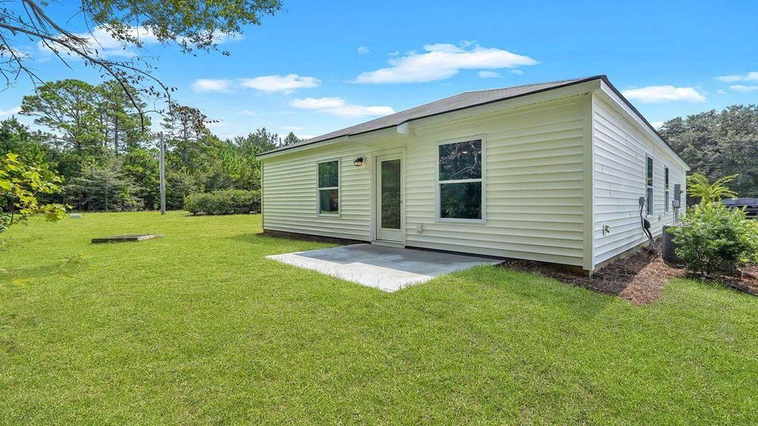 Exterior details and patio area of a home in Longleaf Village, Rincon (Image 17).