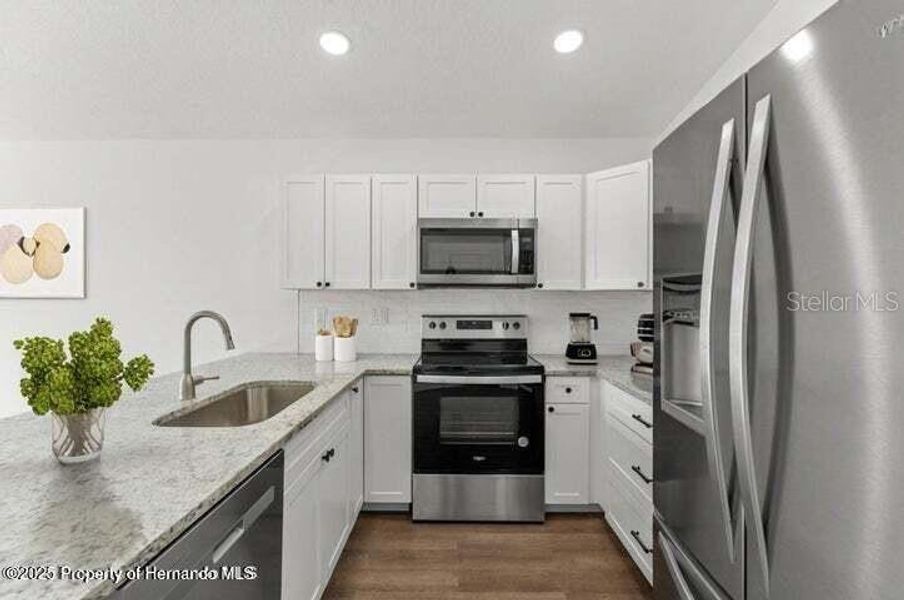 Furnished interior view inside a new home in , Weeki Wachee (Image 7). Furnished interior view inside a new home in , Weeki Wachee (Image 7).