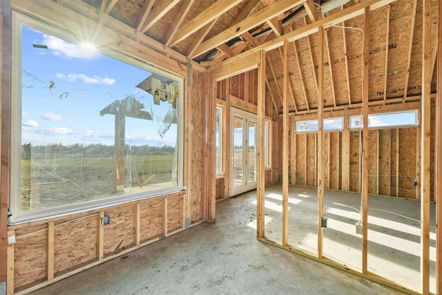 Enter the grand black iron door to the inviting foyer with a stunning picture window welcoming you and your guests with elegance, offering breathtaking views of the expansive scenic landscape. Enter the grand black iron door to the inviting foyer with a stunning picture window welcoming you and your guests with elegance, offering breathtaking views of the expansive scenic landscape.