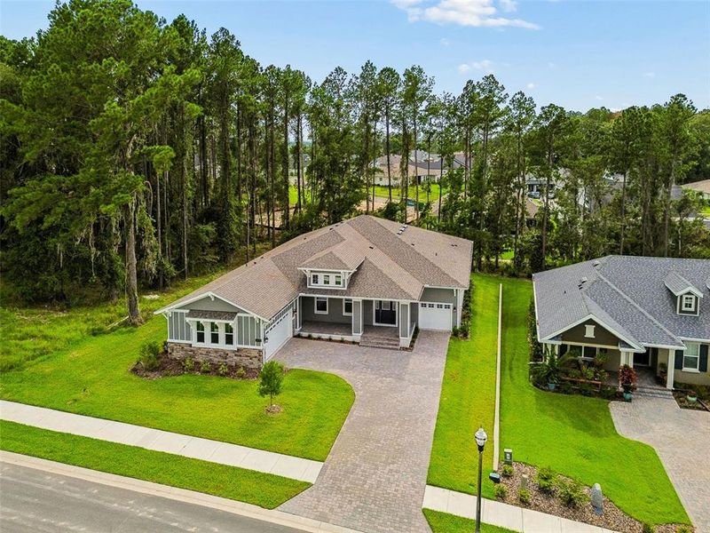 Front exterior of a new home in Southern Hills Plantation, Brooksville, FL, highlighting curb appeal (Image 25). Front exterior of a new home in Southern Hills Plantation, Brooksville, FL, highlighting curb appeal (Image 25).