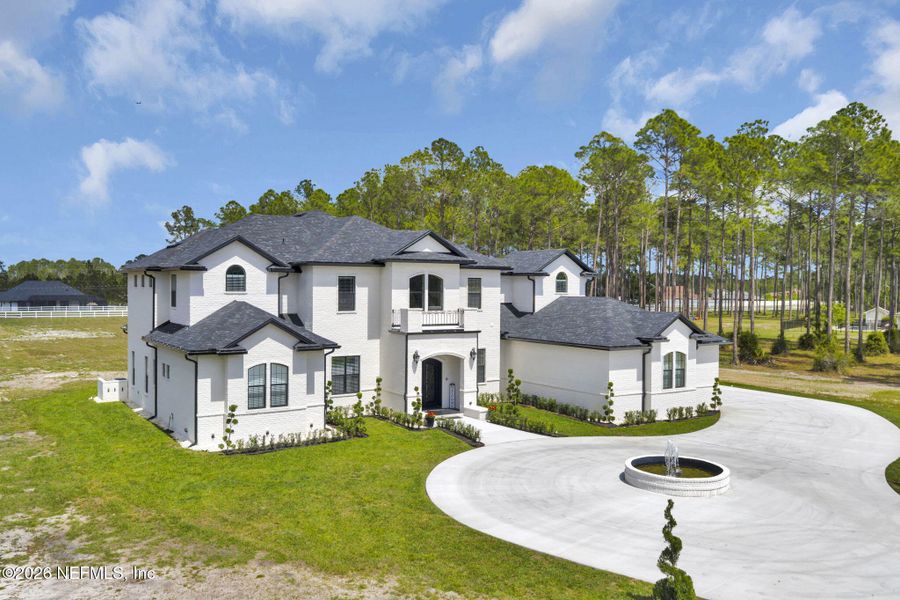 Front exterior of a new home in , Jacksonville, FL, highlighting curb appeal (Image 26).
