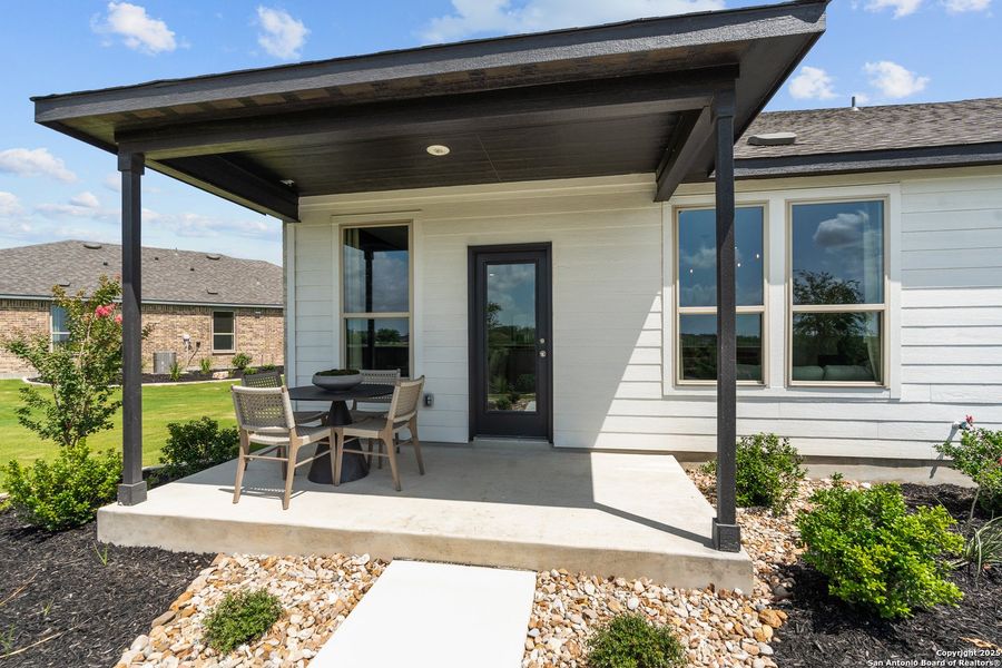 Exterior details and patio area of a home in Dove Song, Marion (Image 3).