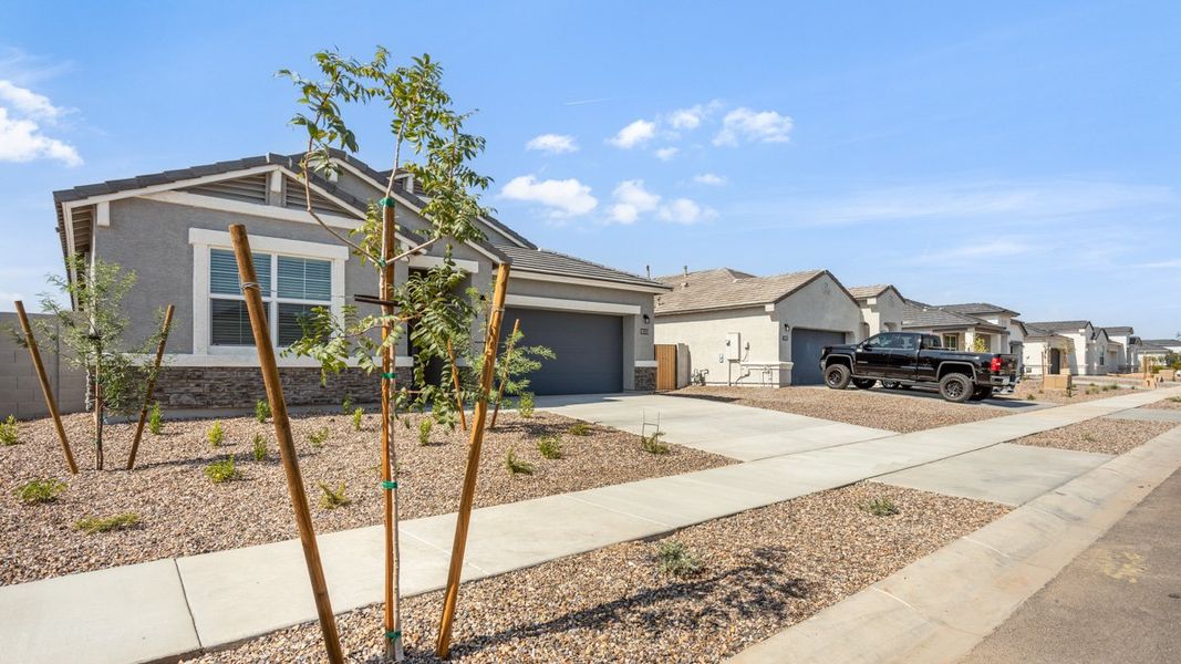 Representative exterior photo of a completed home built from the Blackstone by D.R. Horton in Rio Rancho Estates, Surprise, AZ (Image 22). Representative exterior photo of a completed home built from the Blackstone by D.R. Horton in Rio Rancho Estates, Surprise, AZ (Image 22).