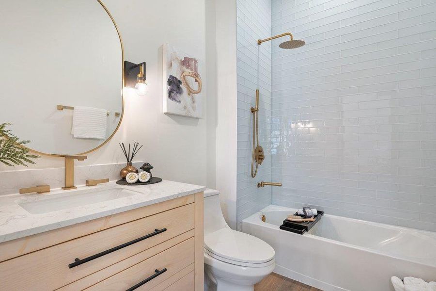 Full bathroom featuring vanity and shower / tub combination