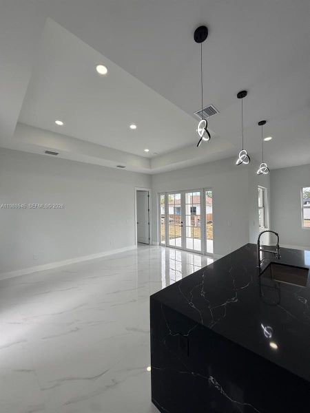 Spacious, unfurnished interior of a new home in , Lehigh Acres (Image 6).