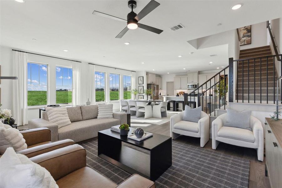 Wonderful family gatherings await in this lovely open concept living-dining area.